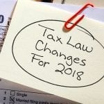 post it note with "Tax Law Changes for 2018" written on it
