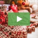 clickable video thumbnail depicting wrapped gifts under a Christmas tree