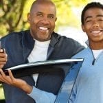 Dad gives car keys to teenage son
