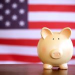 American flag with piggy bank