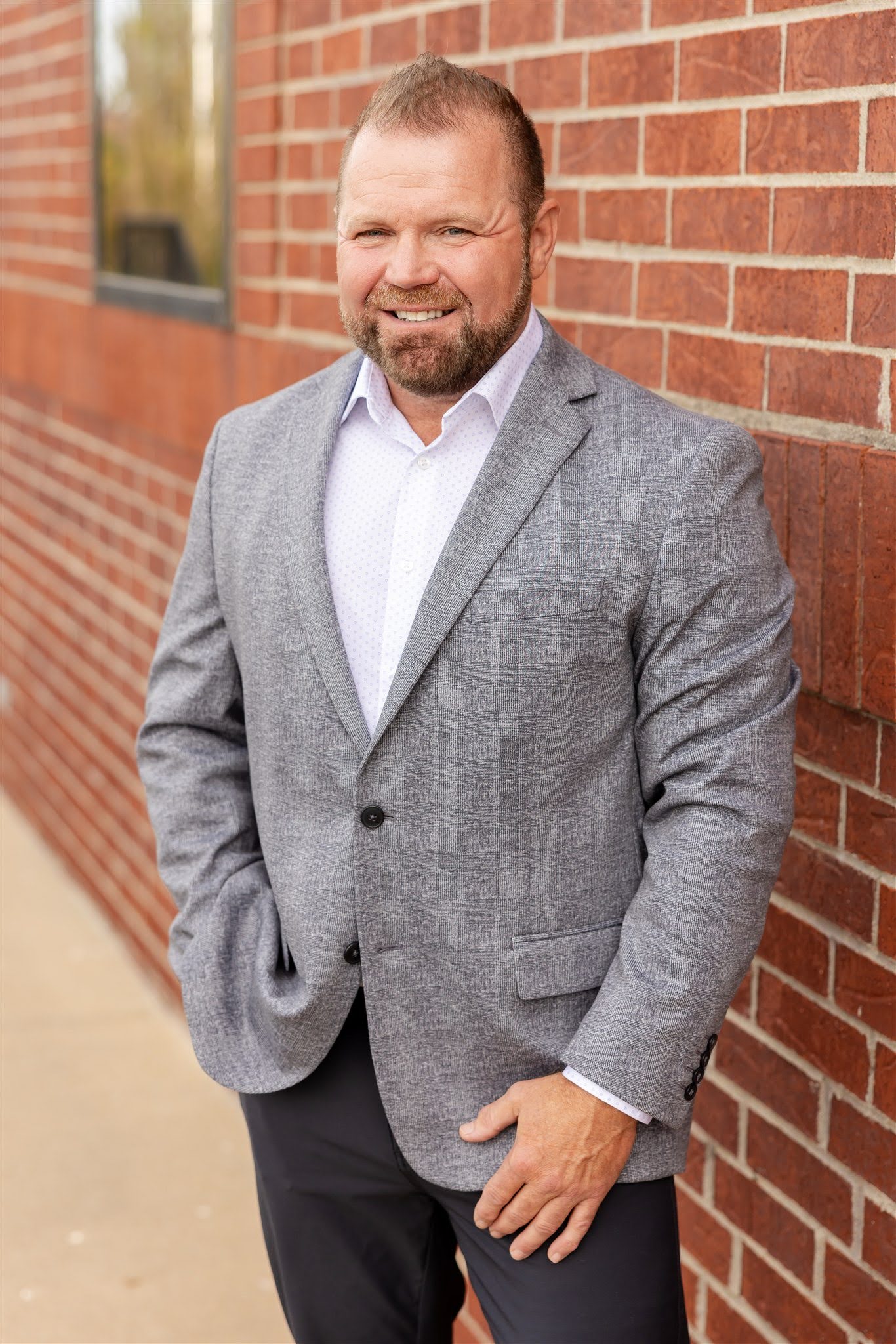 The Resource Center | 2025 Photo of John Schaeffer in grey suit coat